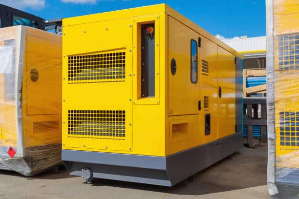 Yellow commercial generators at a plant